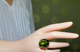 GIA Certified 35.63 Carat Natural Green Peridot Diamonds Rings 18 Karat For Sale at 1stDibs | peridot gia, gia peridot, dark green peridot