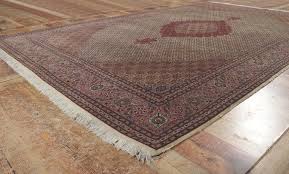 Vintage Persian Mahi Tabriz Rug, Timeless Elegance Meets Historical Richness For Sale at 1stDibs