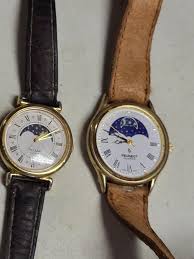 Sold at Auction: pulsar & Peugeot moon phase watches