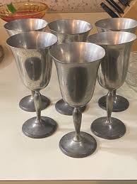 Sold at Auction: GENUINE PEWTER METAL CHAMPAGNE CUPS