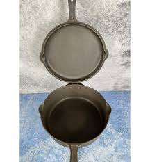 Sold at Auction: Lodge 4 in 1 Cast Iron Skillet Hinged & Hammered