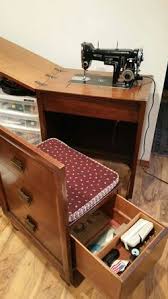 Vintage Necchi BU sewing machine in cabinet with chair & Wonder Wheel & attachments for Sale in Newberg, OR - OfferUp