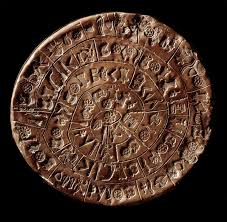 The disc of Phaistos (Minoan Art - 1700 - 1600 BC) covered ...