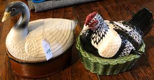 Lot - Large covered dish featuring a swan, made in Portugal, and a soup tureen with a hen on top.