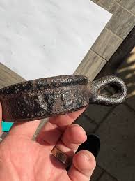 What is this? This object is made of what appears to be iron ...