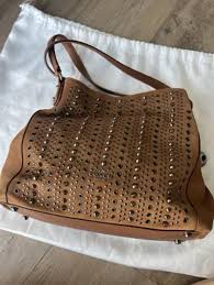 Studded bag by fossil Like new | Mercari