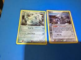 Sold at Auction: (2) Holo-Foil RARE "Aggron" Pokemon Cards
