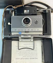 Sold at Auction: Vintage 1950's Polaroid Automatic 100 Land Camera w/ Accessories and Carry Case