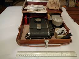 Polaroid Model 150 Land Camera with a large number of ...