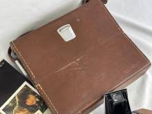 Sold at Auction: POLAROID SX-70 LAND CAMERA AND CASE , UNTESTED