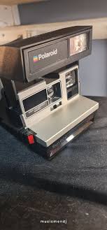 Vintage Polaroid Sun 600 Camera with Strap Never uncoiled. with original box. | eBay Australia