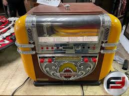 POLYCONCEPT USA OLD-STYLE JUKEBOX, RADIO, CD PLAYER - Freije & Freije Auctioneers