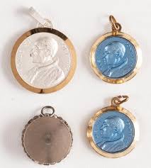 Sold at Auction: FOUR RELICS OF POPE PIUS XII