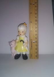 Porcelain Figurine UCAGCO Girl With Yellow Dress Holding ...