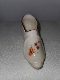 Vintage Victorian white porcelain miniature shoe figurine with flowers gold rim