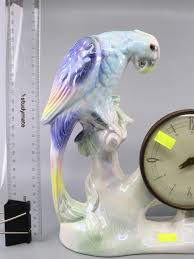 Sold at Auction: VINTAGE GEMA HOLLAND FIGURAL LUSTRE POTTERY PARROT CLOCK CASE WITH GERMAN CLOCK