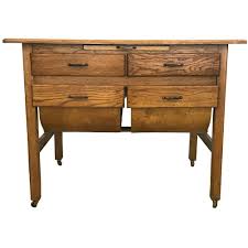 Sold at Auction: Oak Possum Belly Baker's Cabinet - 32"X42"X25"