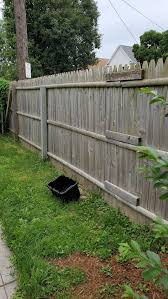 Is it worth re-staining this premade wood panel fence? : r/HomeImprovement