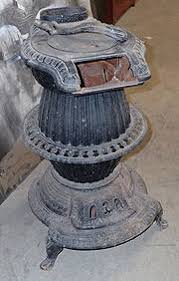 Tall Antique Cast Iron Parlor Stove