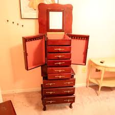 Sold at Auction: Jewelry armoire