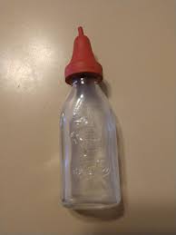 Vintage Glass Baby Doll Bottle with Embossed | Mercari