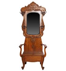 Lot - A Victorian Carved Oak Hall Tree Chair