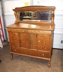Sold at Auction: Antique quarter sawn oak paw foot buffet ...