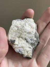 What are these crystals growing on this rock(?) : r/rockhounds
