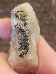 What is this black material on my quartz? : r/Minerals