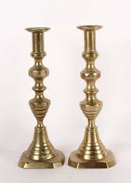 Lot - Sixteen Cast-Brass Candlesticks