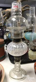 Sold at Auction: Seven Victorian oil lamps, 19th c.