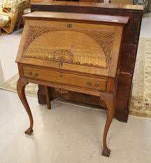 Lot - CARVED OAK SLANT-FRONT WRITING DESK