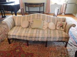 Lot - Baker camelback sofa