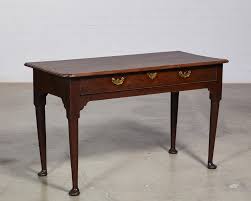 Lot - An English oak writing desk 18th century and later