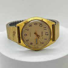 LOT 38J: Men's Watches - Enato, Holzer, Phasar | EstateSales.org