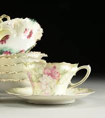 Lot - AN ASSORTMENT OF TWENTY R.S. PRUSSIA PORCELAIN TEA ...