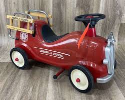 Radio Flyer metal ride on fire truck - Schneider Auctioneers LLC