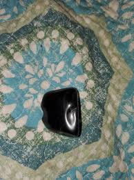 Was told this is rainbow obsidian, not sure. Grey striations inside, I just dont know what obsidian this may be. : r/whatsthisrock