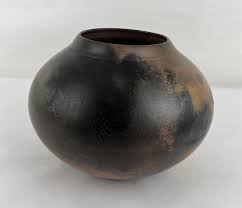 Sold at Auction: SOUTHWEST KILN FIRED POTTERY VASE