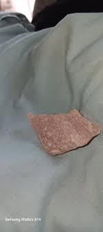 I was given this as a piece of opal. I know it's not opal ...