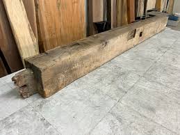 Hand hewn oak mantel beam.
