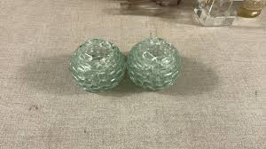 Lot - Two ruby red glasses two crystal candle holder