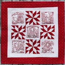 Red and white wall quilt with Nativity scene embroidery - Advanced Embroidery Designs