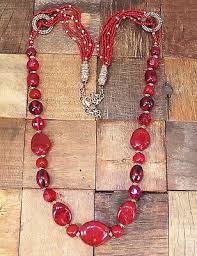 Long red beaded necklace with red swirl beads, red seed ...