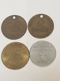 4 TOKENS,SEE PICTURES L861 SEAGRAMS WHISKEY,1861-1961 S.D. ...