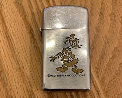VINTAGE ZIPPO SLIM LIGHTER USED WALT DISNEY DONALD DUCK RARE ...