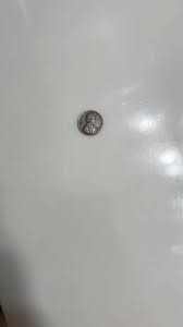 Does this 1951 D Wheat Penny have any value? My aunt that gave it to me told me that it may. Thoughts…also would like to know the proper was to photograph a