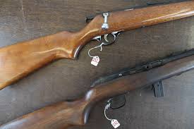 Sold at Auction: TWO 22 CALIBER RIFLES