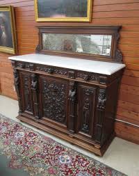 Lot - HIGHLY CARVED WALNUT BUFFET WITH MARBLE TOP, Renai