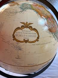 Vintage Standing Rotating Iron Encased Reploge Globe | Chairish